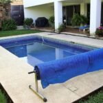 Alberca con lona de calefacción solar en casa en venta en Ocotepec, Cuernavaca