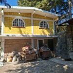 Fachada y cochera de la casa en venta en Huitzilac, Morelos